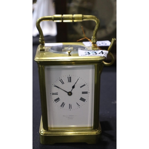 265 - Brass French repeater carriage clock stamped Brevetee, by Howell James & son, London, H: 13cm. UK P&... 