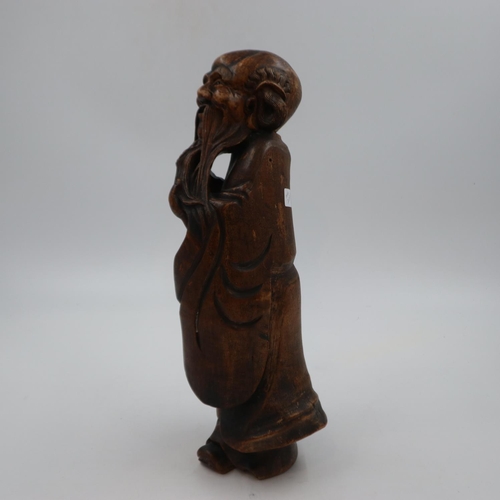 246A - Hardwood Chinese figure of a elderly gentleman with long bread, H: 45 cm, with glass eyes. Not avail... 