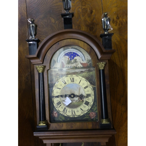 274 - Walnut wall clock with moon phase and painted dial depicting sail boats windmill and flora, with key... 