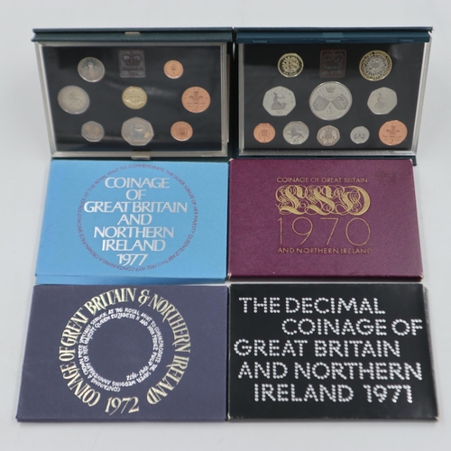 2053 - Deluxe proof UK coin sets, 1984 and 1997, and four further coin sets. UK P&P Group 1 (£16+VAT for th... 