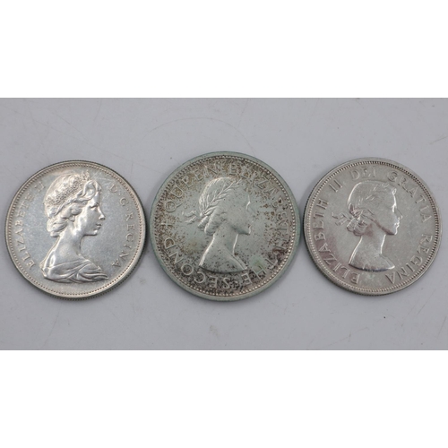 2091 - 1958 and 1967 Canada silver dollars and a Southern Rhodesia 1953 crown. UK P&P Group 0 (£6+VAT for t... 