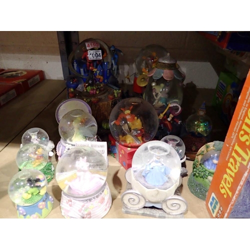 1004 - Group of thirteen Disney Store resin snow globes. Not available for in-house P&P