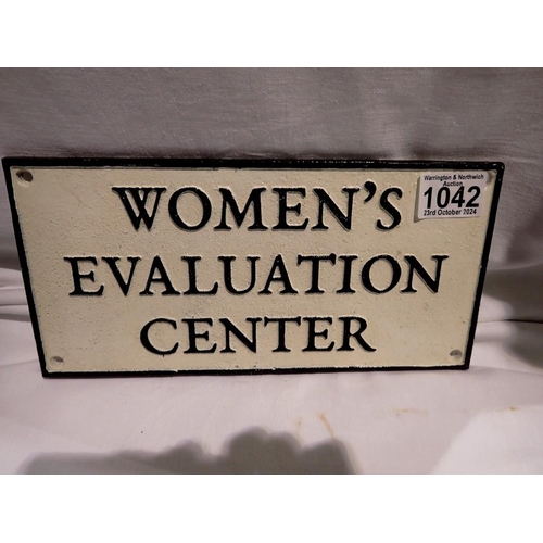 1042 - Cast iron Womens Evaluation centre sign. UK P&P Group 2 (£20+VAT for the first lot and £4+VAT for su... 