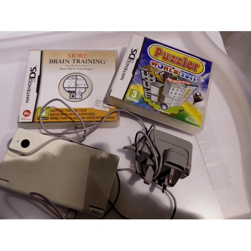 1080 - Nintendo DS, power supply and two games. UK P&P Group 1 (£16+VAT for the first lot and £2+VAT for su... 