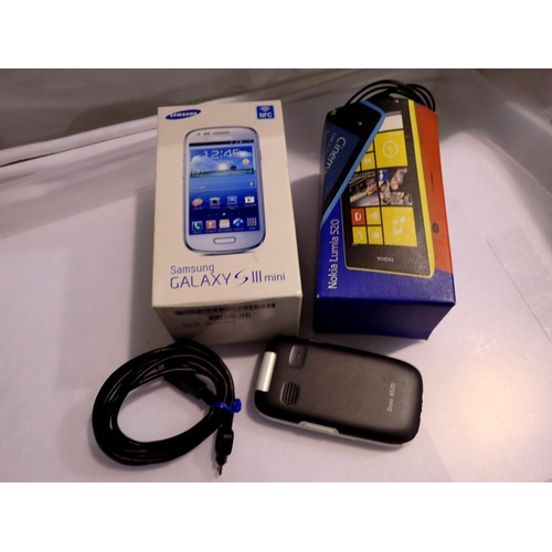 1155 - Three mobile phones, including a Nokia Lumia 520. UK P&P Group 1 (£16+VAT for the first lot and £2+V... 