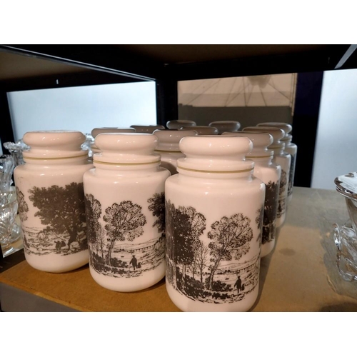 1244 - Collection of twelve opaque white glass coffee storage jars, H: 18cm. Not available for in-house P&P