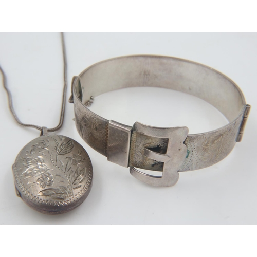 10 - Britannia silver buckle-form bangle, 39g, with a hallmarked silver locket pendant necklace. UK P&P G... 