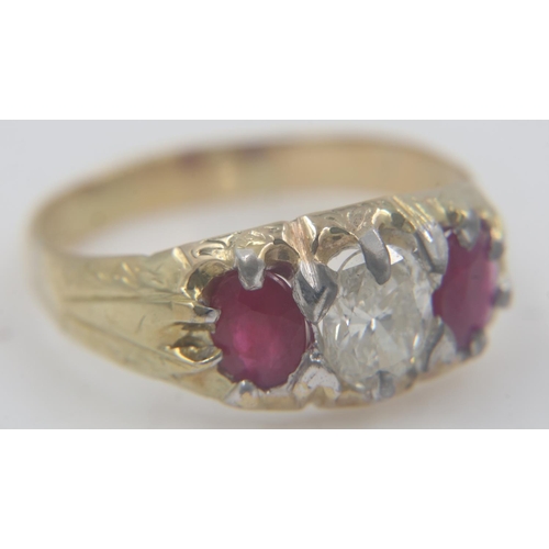 53 - 18ct gold, 0.7ct oval cut diamond and ruby trilogy ring, size O/P, 3.5g. UK P&P Group 0 (£6+VAT for ... 