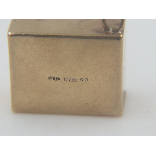 55 - 9ct gold cased 10 shilling note charm, 2.4 grams. UK P&P Group 0 (£6+VAT for the first lot and £1+VA... 