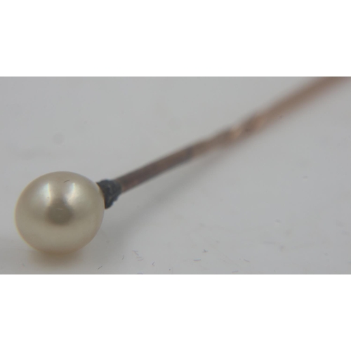 63 - Antique pearl and diamond-set stick pin in rose gold, L: 70 mm, 1.2g. UK P&P Group 0 (£6+VAT for the... 