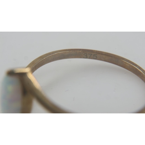 64 - 9ct gold opal set ring, size P, 1.1g. UK P&P Group 0 (£6+VAT for the first lot and £1+VAT for subseq... 