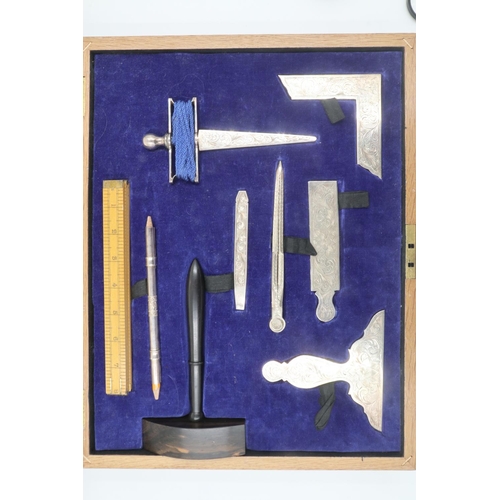 105 - Set of silver plated Masonic Lodge Working Tools, set within a velvet lined fitted oak box. Box size... 