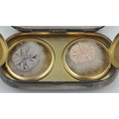 127 - Hallmarked silver ladies twin compact with engine turned decoration and gilt washed interior. UK P&P... 