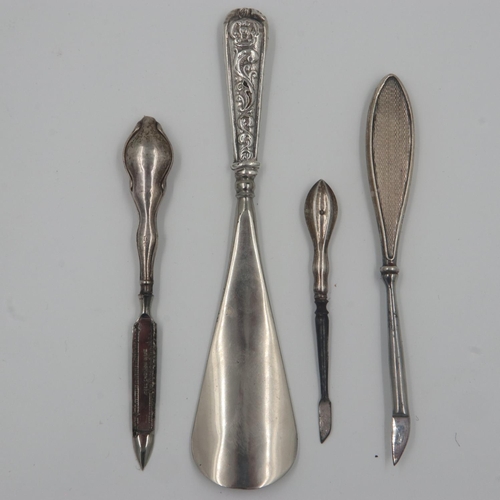 139 - Three silver handled nail files and a shoehorn. UK P&P Group 1 (£16+VAT for the first lot and £2+VAT... 