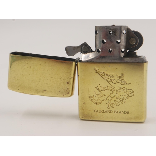 150 - Brass Zippo lighter, inscribed 'Falkland Islands! Invaded by Argentine forces 2nd April 1982, libera... 