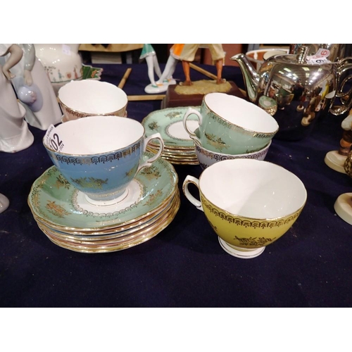 1302 - Harlequin set of six Colclough tea trios. Not available for in-house P&P