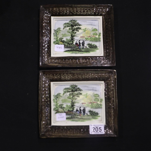 205 - Two late 19th century hand painted ceramic wall plaques, 20 x 18 cm. One of the plaques has two chip... 