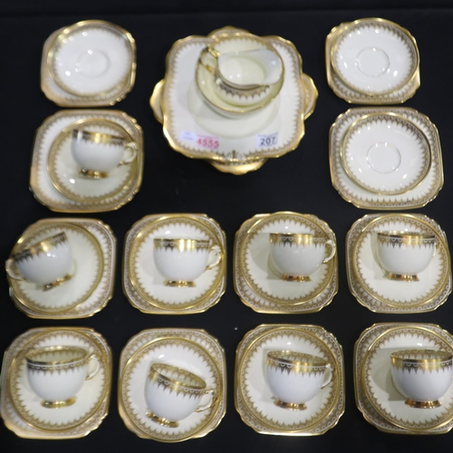 207 - Plant Tuscan ivory and gilt tea set of thirty seven pieces. Not available for in-house P&P