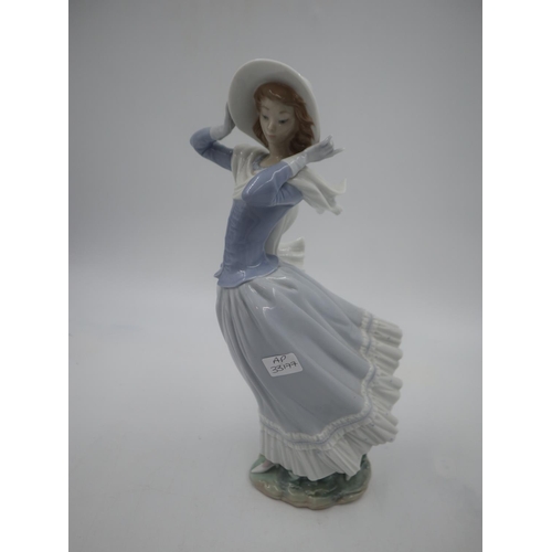 261 - Large Lladro figure of a young lady, H: 36cm. UK P&P Group 3 (£30+VAT for the first lot and £8+VAT f... 