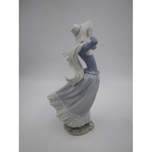 261 - Large Lladro figure of a young lady, H: 36cm. UK P&P Group 3 (£30+VAT for the first lot and £8+VAT f... 