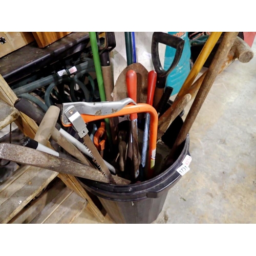 1731 - Bin of mixed tools, mainly garden tools. Bin is not include in this lot. Not available for in-house ... 