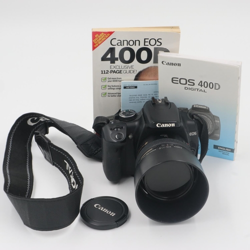 161 - Canon EOS 400D digital camera with a Canon EF 50mm 1:1.4 lens and booklets. No charger. UK P&P Group... 