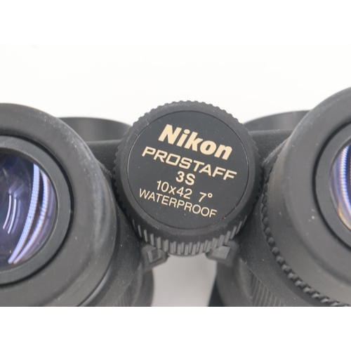 163 - Cased pair of Nikon Prostaff 35 binoculars, optically good, condition good, lens caps are present. U... 