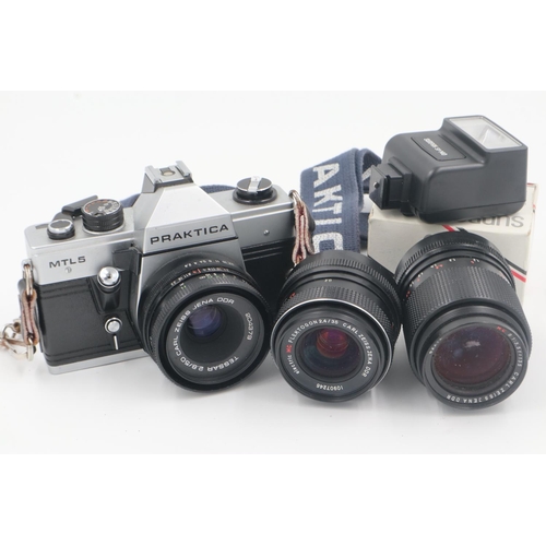 166 - Praktica MTL5 35mm film camera, with three Carl Zeiss lenses, soft carry case and flash unit. UK P&P... 