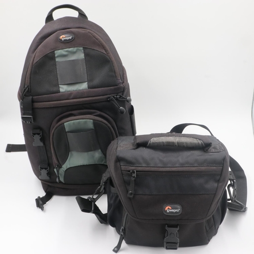 168 - Lowepro padded camera cross-body rucksack and a further Lowepro camera case. UK P&P Group 2 (£20+VAT... 