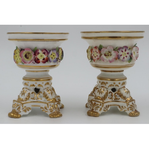 190 - Two 19th Century Derby pot-pourri vessels, lacking covers, with floral encrusted decoration, h: 9 cm... 