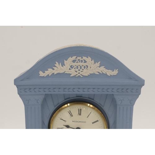 199 - Wedgwood blue Jasperware mantel clock with a pair of candlesticks, height of tallest 22cm. UK P&P Gr... 