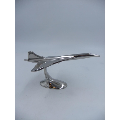 316 - Chrome Concorde on stand. H: 16cm. UK P&P Group 2 (£20+VAT for the first lot and £4+VAT for subseque... 