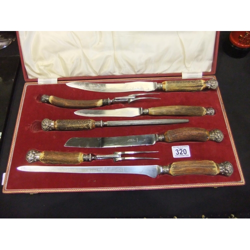 320 - Cased Harrods of London six piece antler handled carving set. Not available for in-house P&P