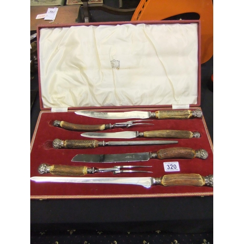 320 - Cased Harrods of London six piece antler handled carving set. Not available for in-house P&P