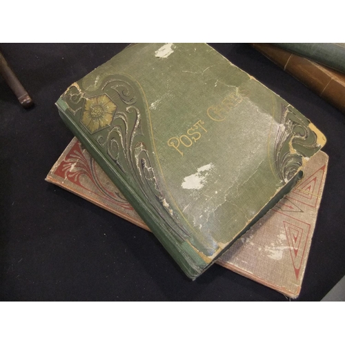 347 - Two postcard albums with approximately 350 topographical and subject matter postcards. UK P&P Group ... 