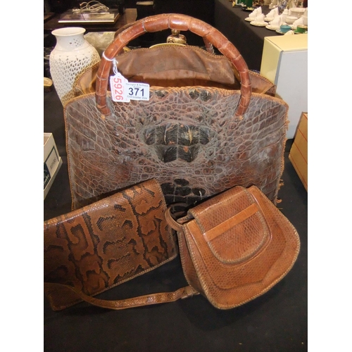 371 - Three vintage bags, large crocodile bag with a snakeskin handbag and a lizard skin handbag. Not avai... 