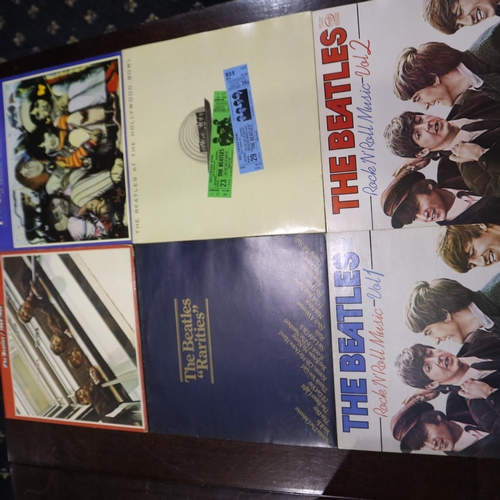 389 - Six The Beatles LPs, The Beatles 1962-66 in red vinyl Beatles at Hollywood Bowl, Rock n Roll Music v... 