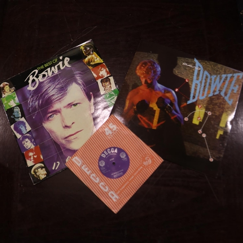 391 - Two David Bowie LPs, Lets Dance, The Best of David Bowie and vinyl single (mono) The Laughing Gnome.... 