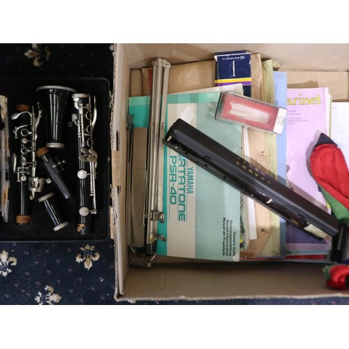 378 - Bundy Resonite clarinet with case, a Yamaha recorder, stand and music books. Not available for in-ho... 