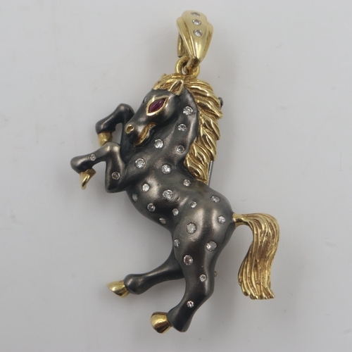 51 - 18ct gold, yellow and oxidized finish, set with natural diamonds and ruby, horse shaped pendant / br... 