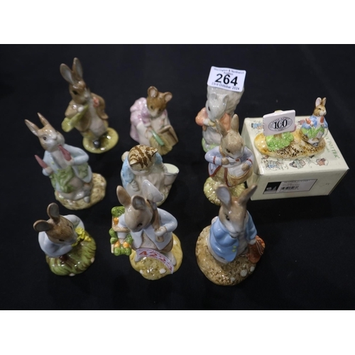 264 - Nine Royal Albert Beatrix Potter figures, with a boxed Schmid Beatrix Potter collectable thimble. UK... 