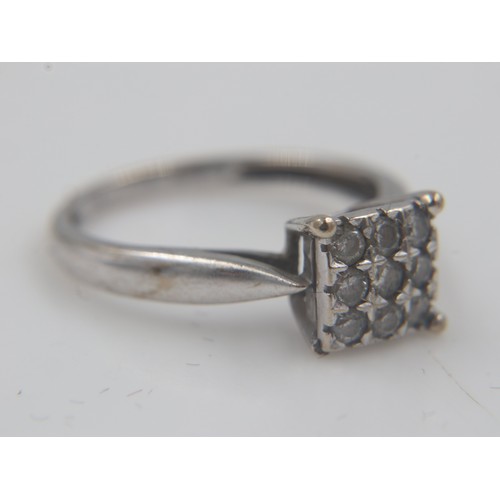 67A - 9ct white gold ring set with nine small diamonds in a square-form setting, size H/I, 1.6g. UK P&P Gr... 