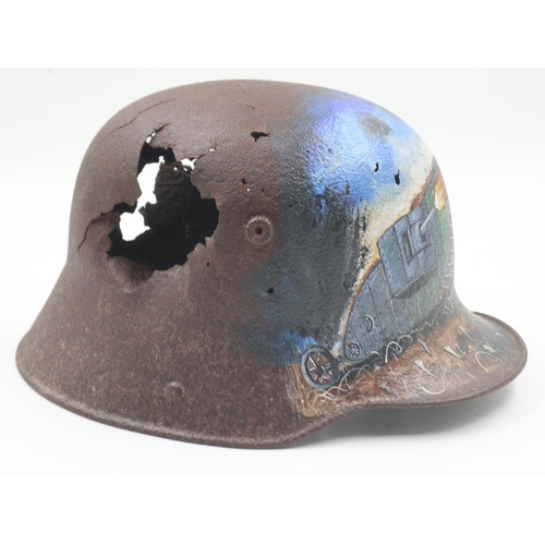 2166 - WWI Imperial German Battle Damaged M16 Stahlhelm Helmet that was found Cambrai, France, where the fi... 