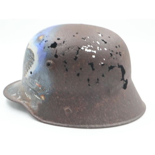 2166 - WWI Imperial German Battle Damaged M16 Stahlhelm Helmet that was found Cambrai, France, where the fi... 