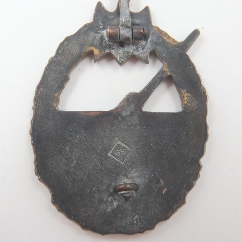 2239 - WWII German Kriegsmarine Coastal Artillery Badge. Marked “65” in a diamond shaped box for the Klein ... 