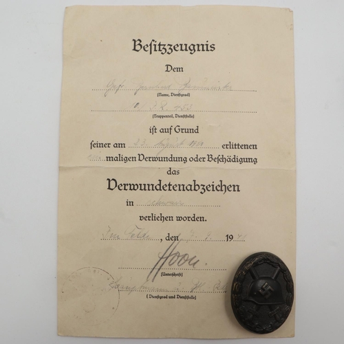 2245 - WWII German 3rd Class Wound Badge in Black Representing Iron & Award Certificate to a soldier in the... 