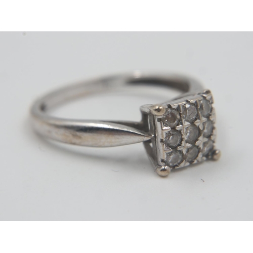 13 - 9ct white gold ring set with nine small diamonds in a square-form setting, size H/I, 1.6g. UK P&P Gr... 