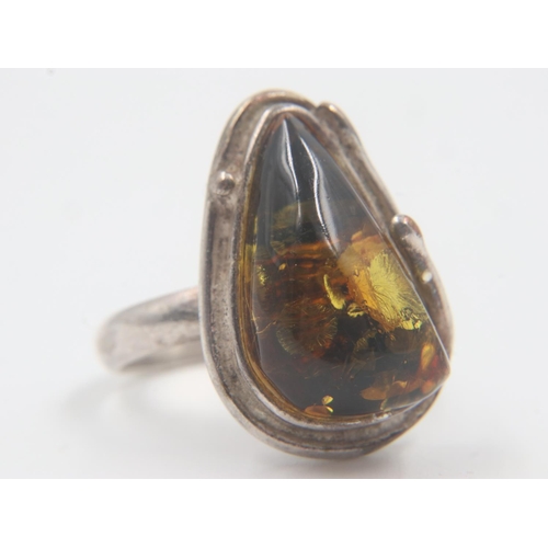 15 - Silver and amber dress ring, size O. UK P&P Group 0 (£6+VAT for the first lot and £1+VAT for subsequ... 