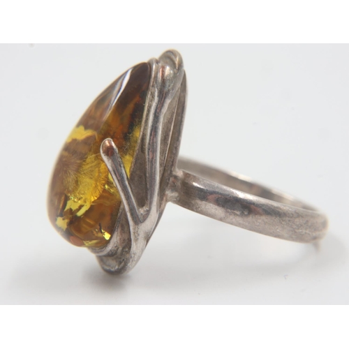 15 - Silver and amber dress ring, size O. UK P&P Group 0 (£6+VAT for the first lot and £1+VAT for subsequ... 