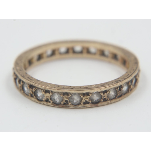 38 - 9ct gold full eternity ring, set with white topaz, size M, 2.2g. UK P&P Group 0 (£6+VAT for the firs... 